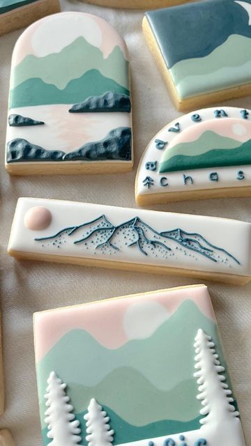 Nature-Inspired Cookie Designs Showcase Tranquil Landscapes in Soft Pastels.