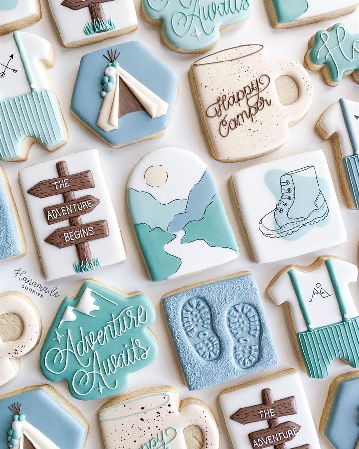 Whimsical Camping-Themed Cookie Designs in Soft Pastels for Nature Celebrations.