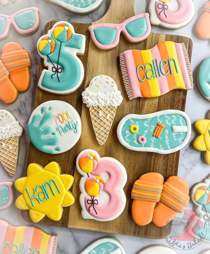 Vibrant Summer Pool Party Cookie Designs Featuring Playful Shapes and Colors.