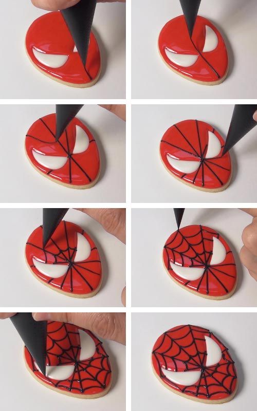 Spider-Man-Inspired Cookie Design: Bold Red Mask with Artistic Web Pattern.