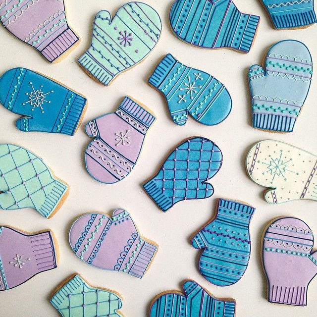 Whimsical Winter-Themed Mittens Showcase Pastel Cookie Designs for Festive Celebrations.