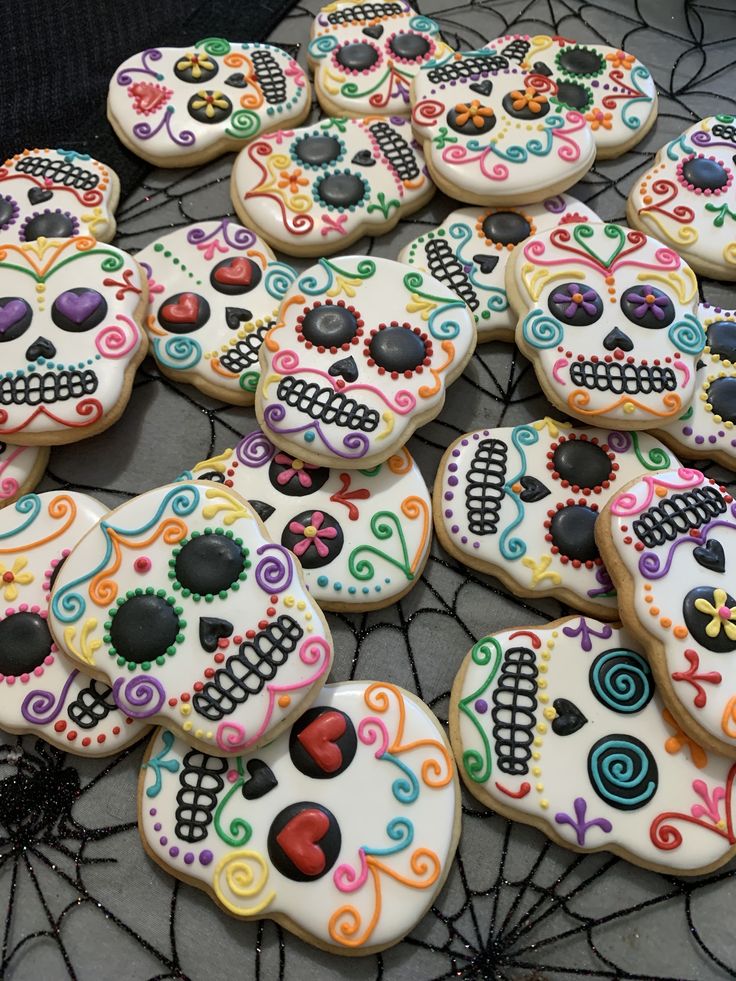 Vibrant Sugar Skull Cookies Inspire Creative Nail Art with Traditional Mexican Designs.