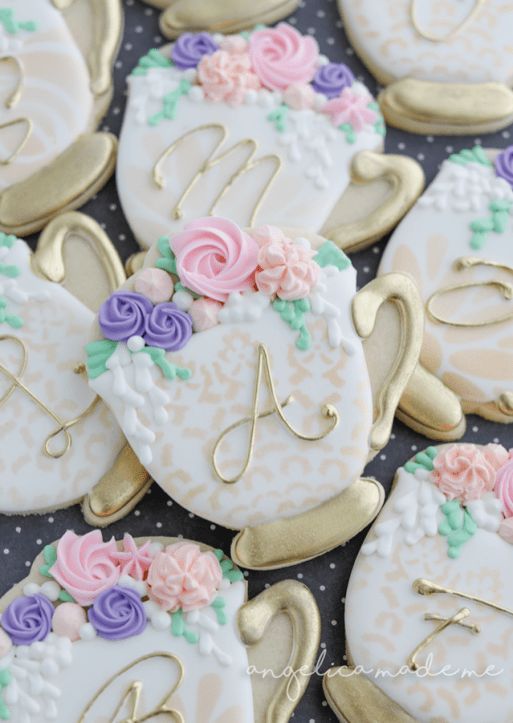 Charming Floral-Themed Cookies: Elegant Teacup Designs with Sophisticated Gold Accents