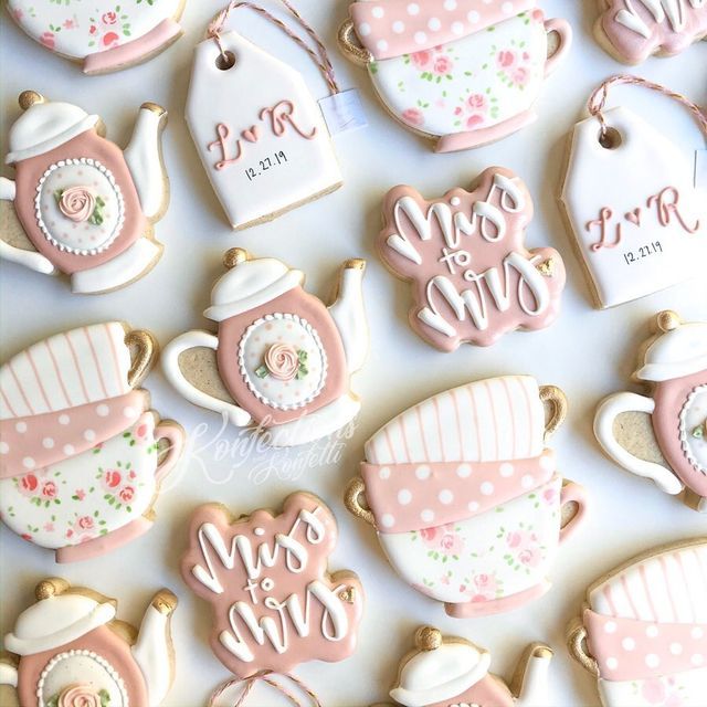 Charming Tea-Themed Cookies with Floral Designs and Whimsical Shapes.