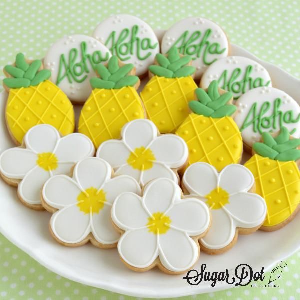 Tropical Pineapple and Floral Cookies: Bright, Festive Treats for Summer Celebrations.