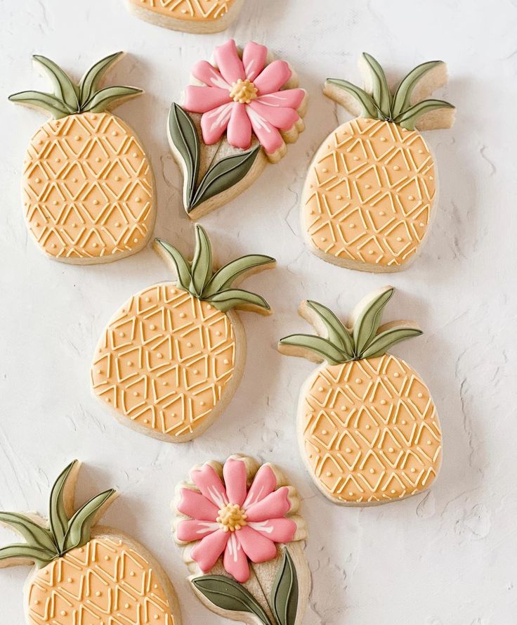 Tropical-Inspired Cookies with Geometric Pineapples and Vibrant Floral Decorations.