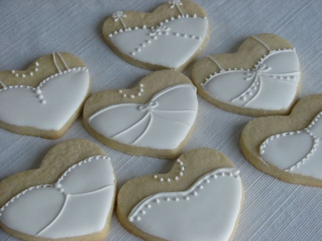 Charming Heart-Shaped Wedding Cookies with Intricate Icing Designs