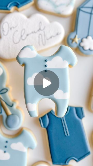 Charming Baby Onesie Cookies in Soft Blue Hues for Playful Celebrations