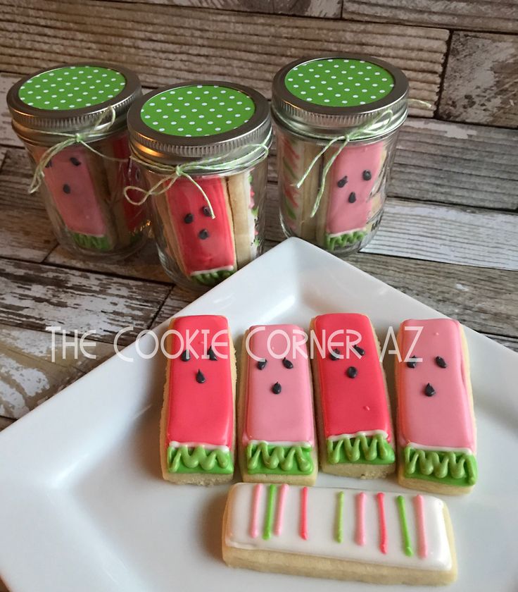 Whimsical Watermelon-Inspired Cookies in Charming Mason Jar Packaging.