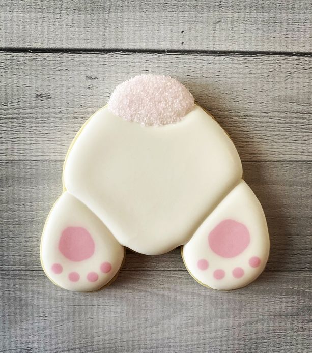 Whimsical Bunny-Shaped Cookie Design: Soft Pastels and Cute Accents for Festive Inspiration.