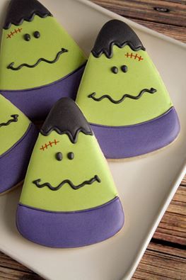 Whimsical Triangle-Headed Monster Halloween Cookies: Vibrant Treats for Festive Celebrations.