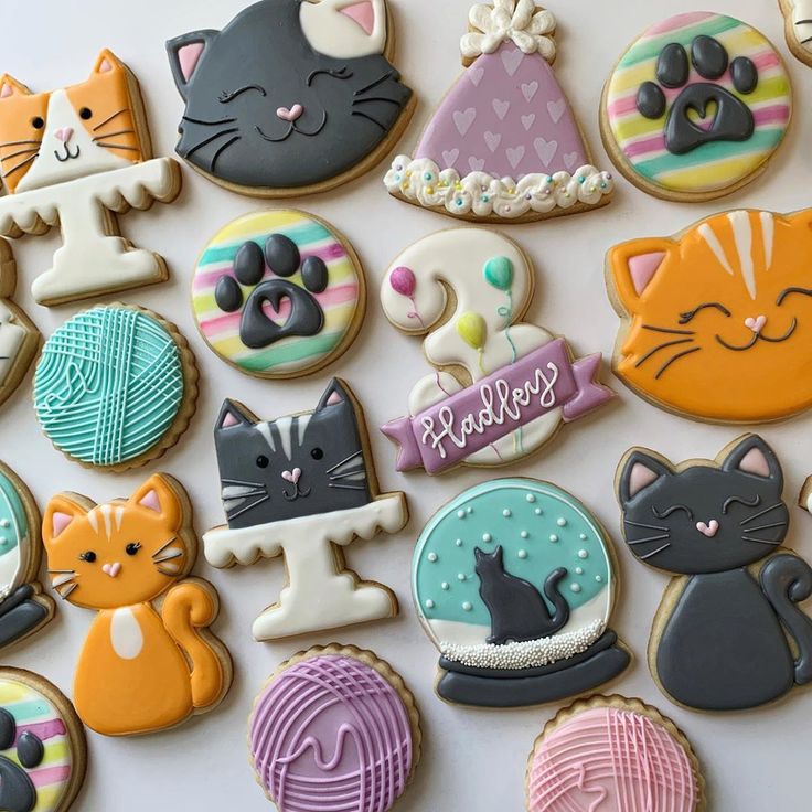 Delightful Cat-Themed Cookies: A Festive Visual Feast of Colorful Designs and Icing Details.