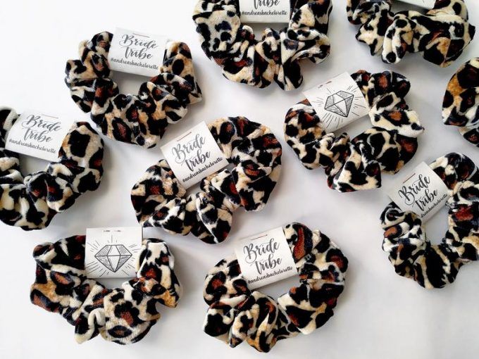 Elegant Leopard Print Scrunchies: Trendy Hair Accessory for a Cohesive Look.