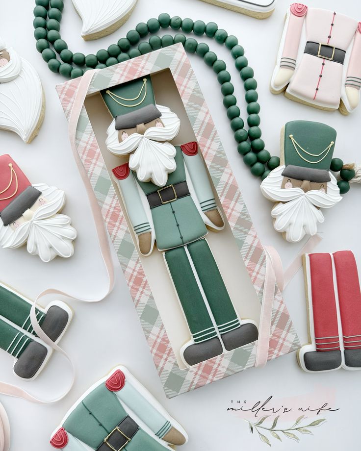 Whimsical Holiday Cookies: Intricately Designed Nutcracker Creations in Pastel Hues.