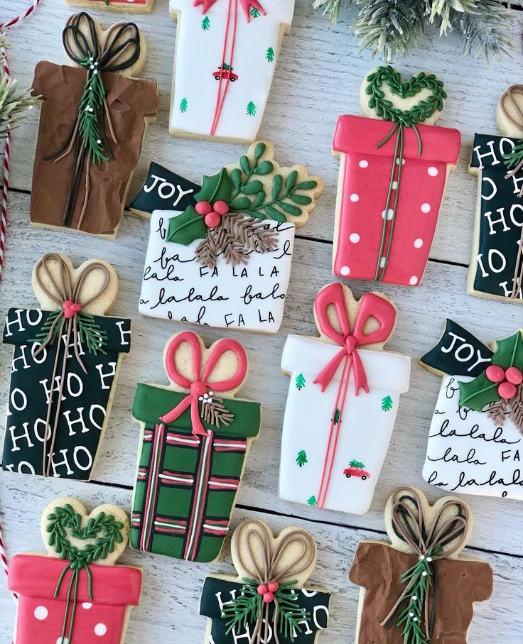 Festive Holiday Cookies: Colorful Gift Boxes with Cheerful Icing Designs for Celebrations.