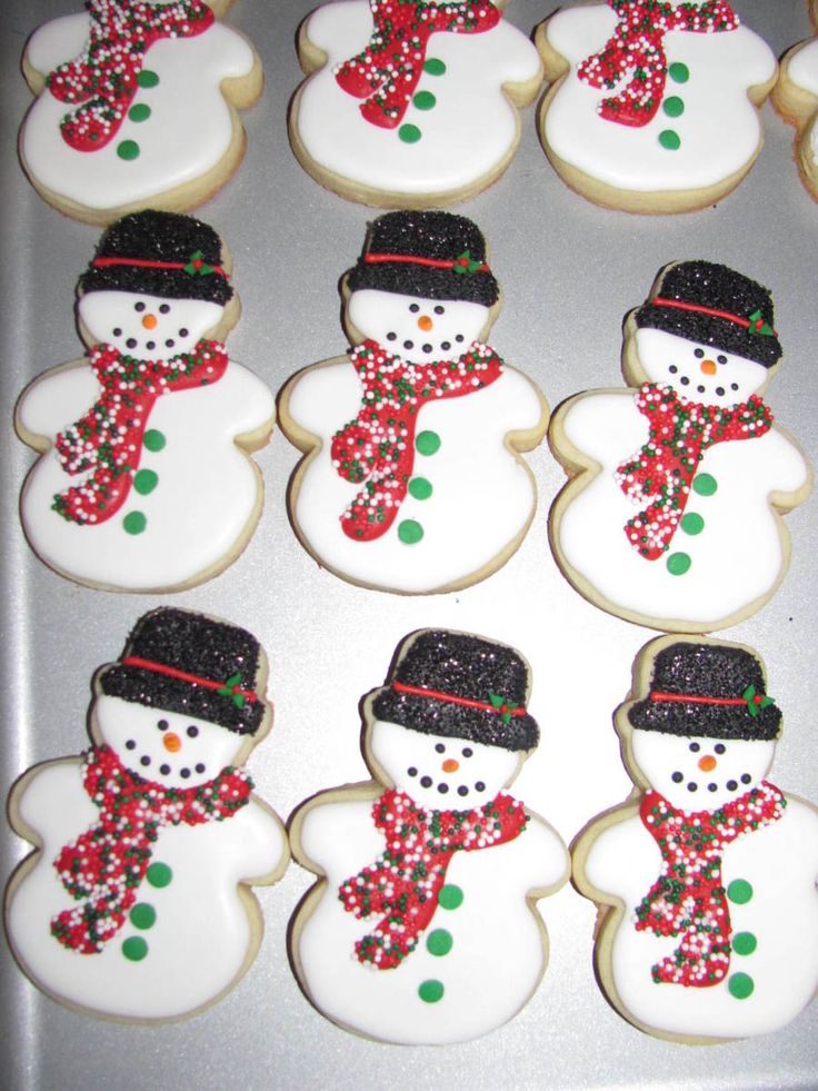 Delightful Snowman Cookies: Festively Adorned Treats for Winter Celebrations.