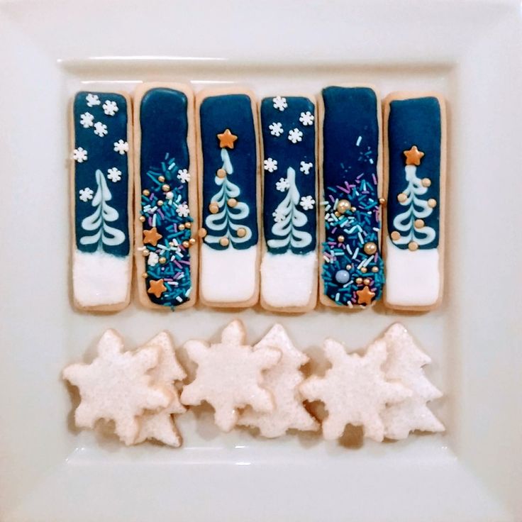 Creative Winter-Themed Cookies: Cozy Holiday Spirit on a White Plate