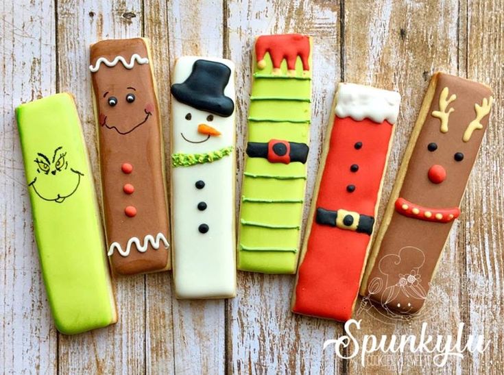 Cheerful Holiday Character Cookie Designs with Vibrant Icing for Festive Celebrations.