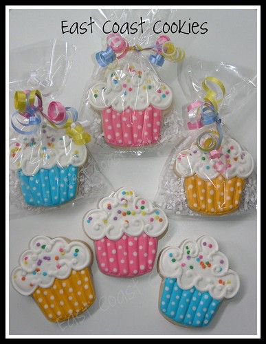 Playful Cupcake-Shaped Cookies Dazzle with Vibrant Colors and Icing Delight.