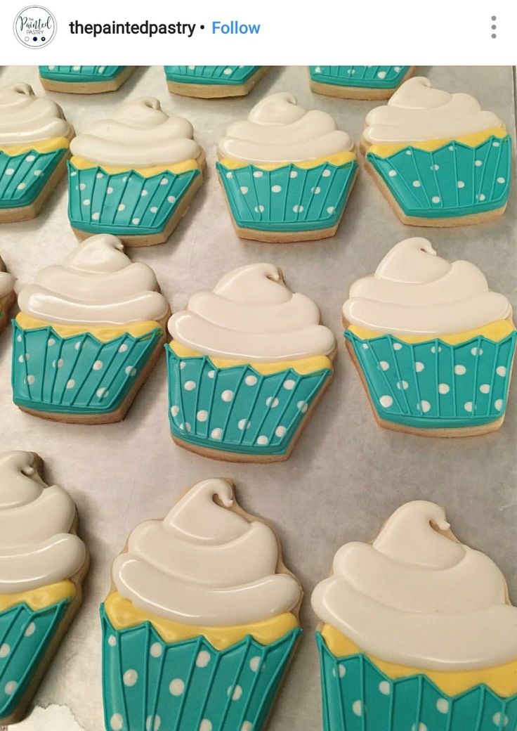 Whimsical Cupcake-Shaped Cookies with Colorful Frosting and Polka Dot Wrappers.