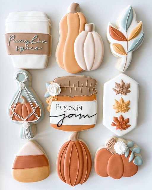 Autumn-Themed Decoratively Iced Cookies: A Festive Celebration in Warm Colors and Creative Designs.