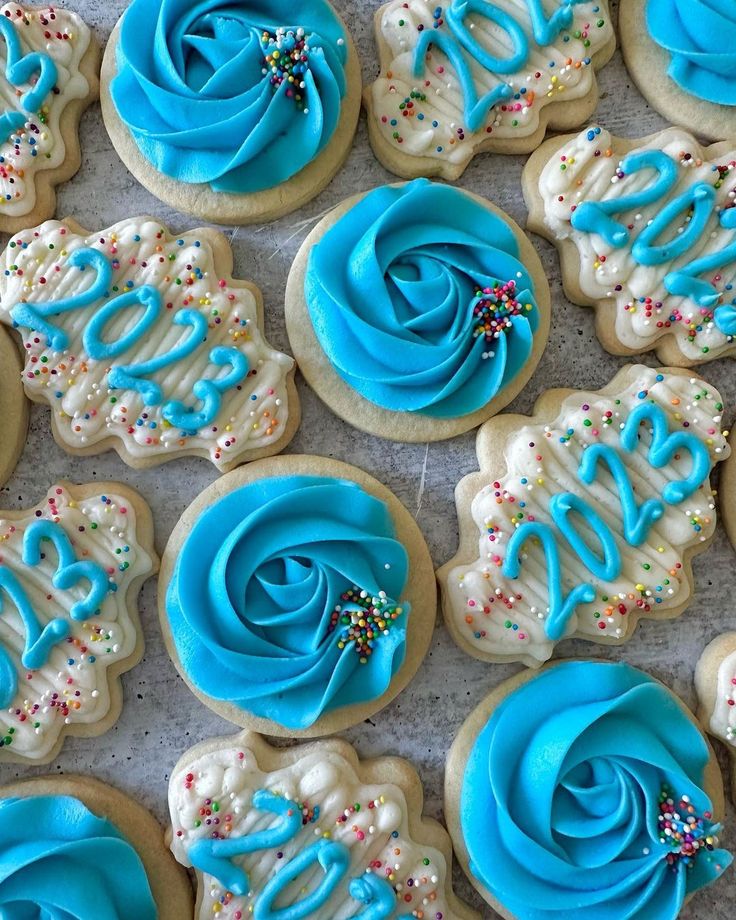 Festive Colorful Cookies: Whimsical Blue Frosting and Sprinkles for Joyful Celebrations.