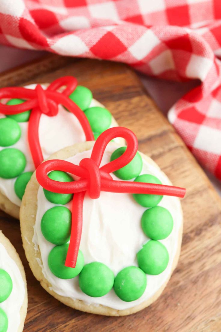 Festive Christmas Wreath Cookies Adorned with Vibrant Candies and Cheerful Red Bows