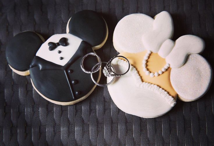 Playful Character Cookies in Formal Attire with Romantic Ring Accents.