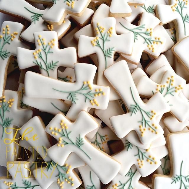 Charming Cross-Shaped Cookies Inspire Floral Nail Designs with Intricate Icing Details.