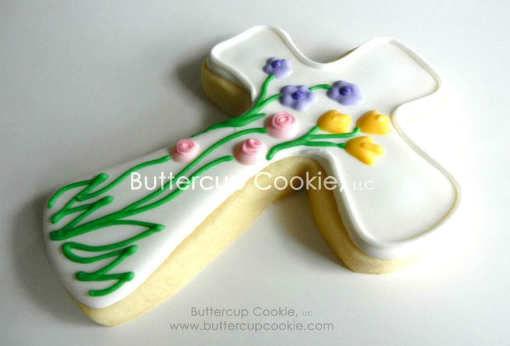 Vibrant Cross-Shaped Cookie with Floral Designs Ideal for Celebrations and Religious Events