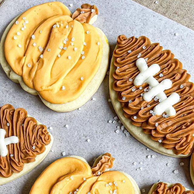 Vibrant Autumn Cookies Decorated with Pumpkin and Football Shapes