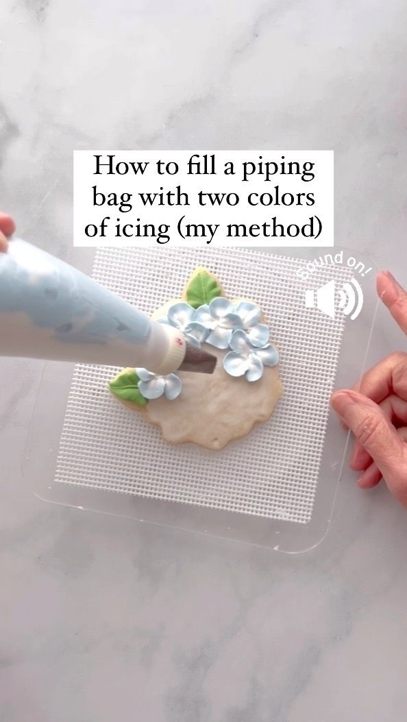 Demonstrating Intricate Piping Techniques for Beautiful Cookie Designs.