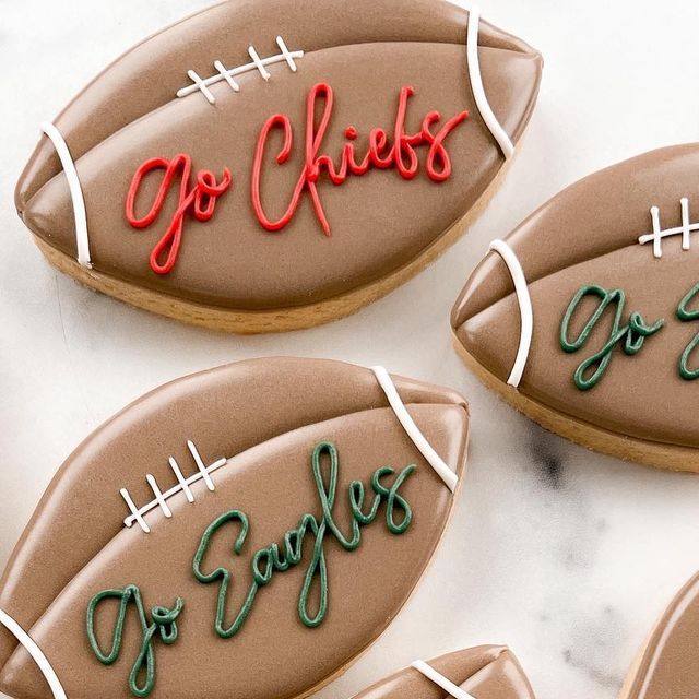 Creative Football-Inspired Nail Design: Brown Hues and Team Spirit Accents for Game Day Celebrations.