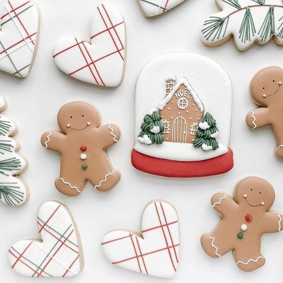 Festive Gingerbread Cookie Assortment: Adorable Figures and Intricate Holiday Designs.