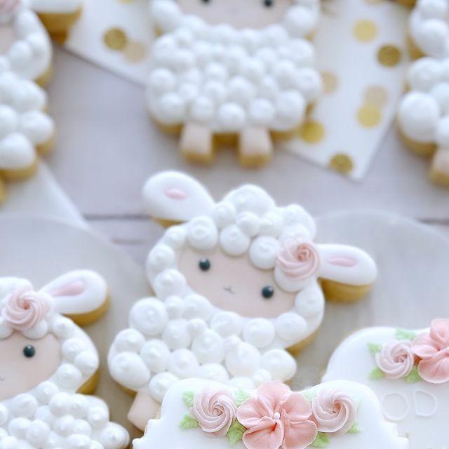 Whimsical Pastel Sheep-Shaped Cookies with Floral Accents for Celebrations