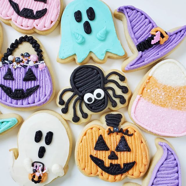 Whimsical Halloween Cookies with Adorable Ghosts, Pumpkins, and Spiders in Vibrant Colors