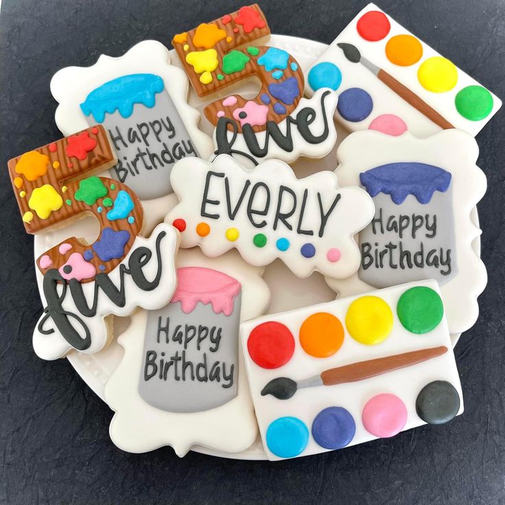 Whimsical Artistic Birthday Cookies with Colorful Designs and Festive Themes.