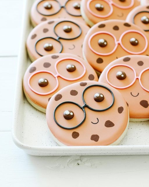 Playful Cartoon-Inspired Cookie Designs with Whimsical Faces and Details.