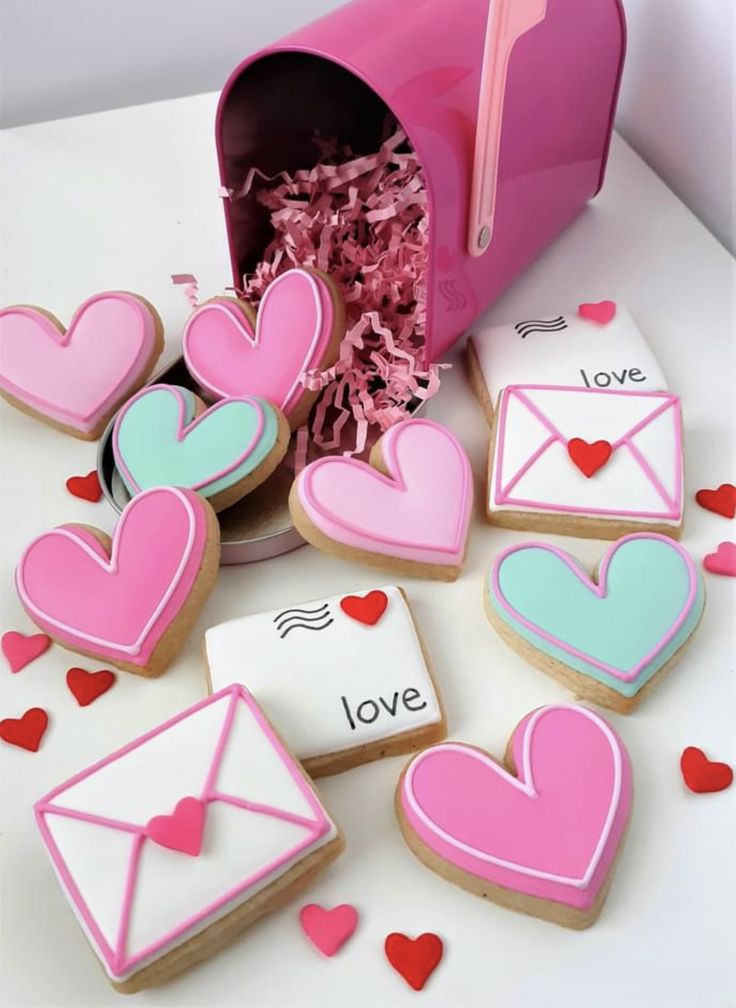 Festive Whimsical Heart-Shaped Cookies with Charming Envelope Designs and Vibrant Displays