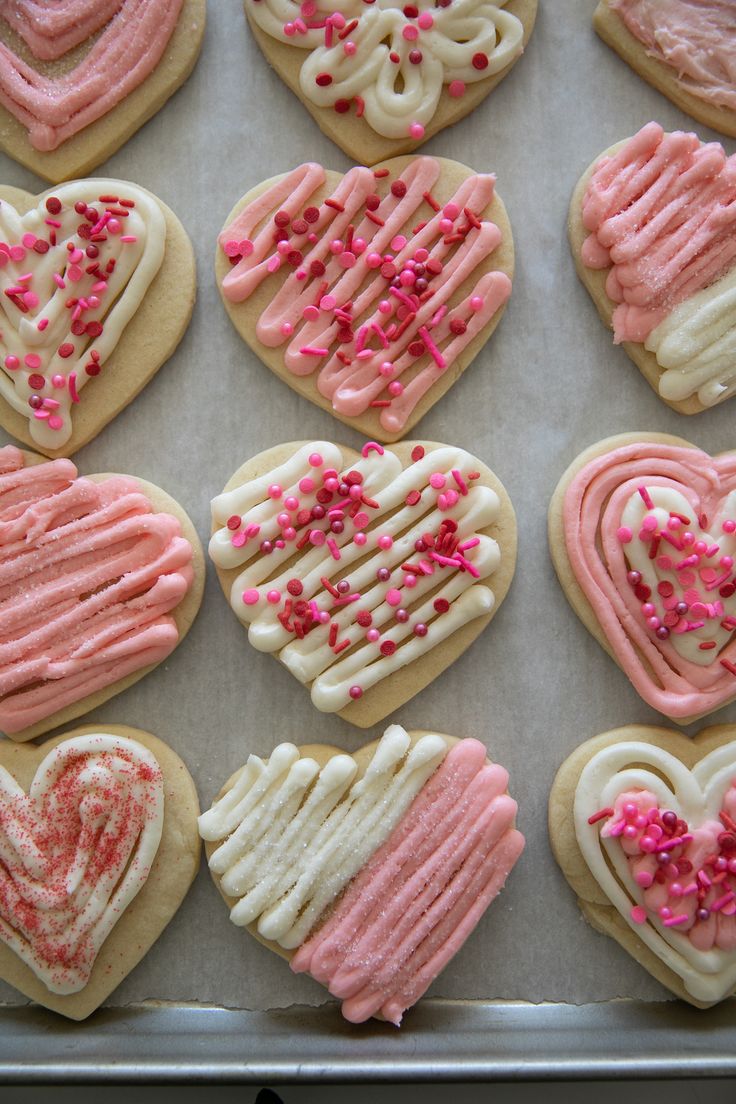 Festive Heart-Shaped Cookies with Colorful Icing and Sprinkles