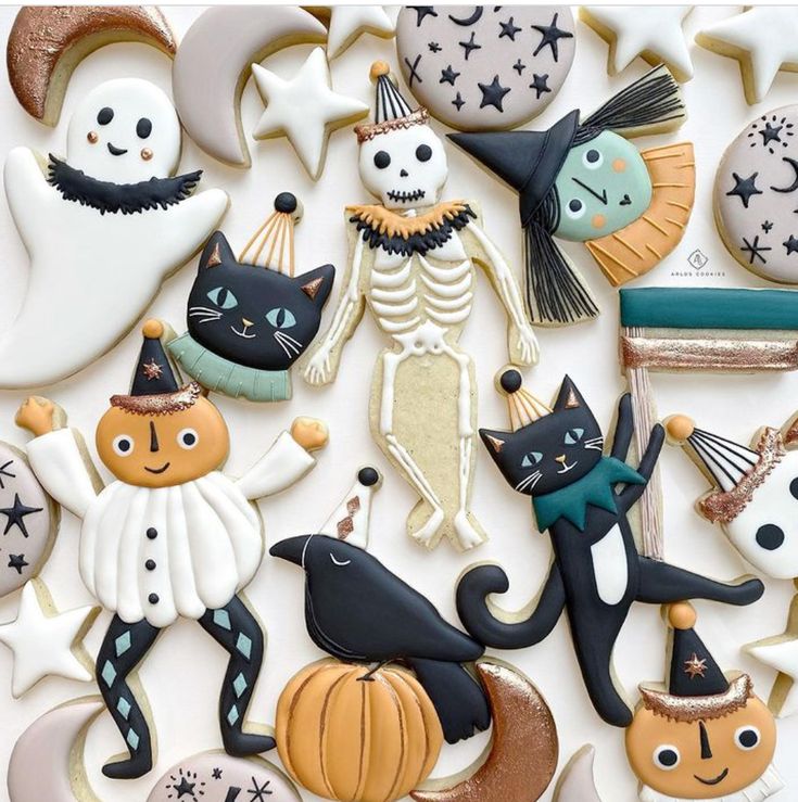 Whimsical Halloween Cookies Decorated with Colorful Ghosts, Skeletons, and Black Cats.