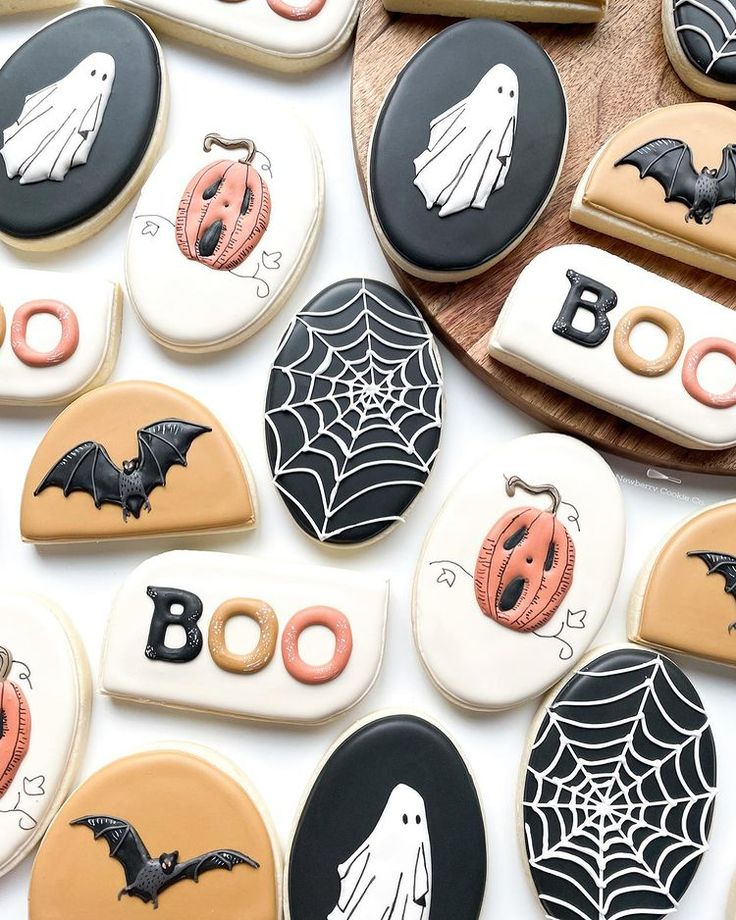 Festive Halloween Cookies with Whimsical Spooky Designs.