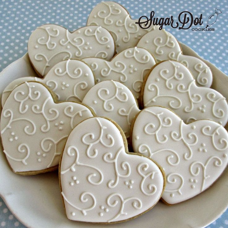 Charming Heart-Shaped Cookies Inspire Elegant Nail Art Designs for Romantic Occasions.