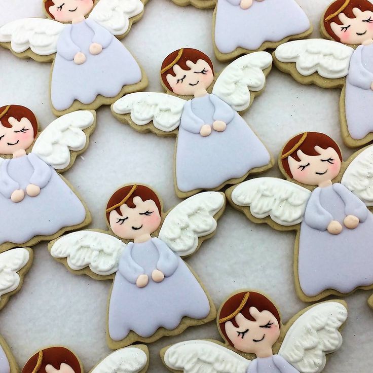 Whimsical Angel-Themed Pastel Cookies for Celebrations.