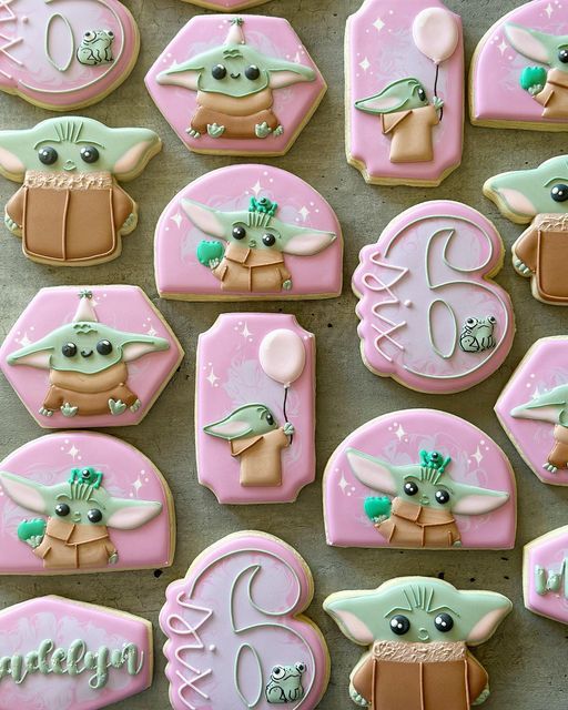 Whimsical Cookie Designs with Adorable Characters in Soft Pastels for Creative Celebrations.