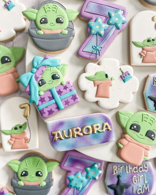 Playful Birthday Cookies: Adorable Green Characters with Soft Pastel Accents