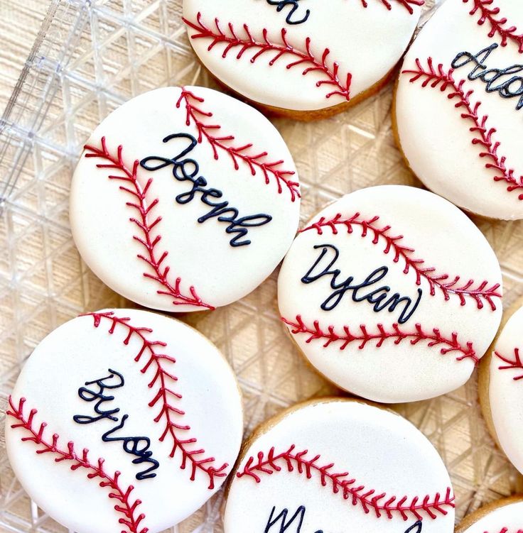 Baseball-Themed Decorative Cookies with Personalized Names and Icing Details