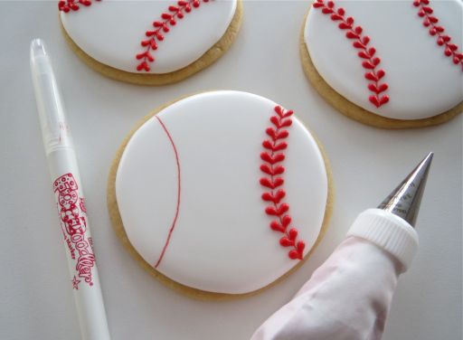 Sporty Baseball-themed Cookies with Red Icing Detailing for Themed Events.