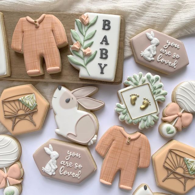 Whimsical Baby-Themed Cookie Designs in Soft Pastels