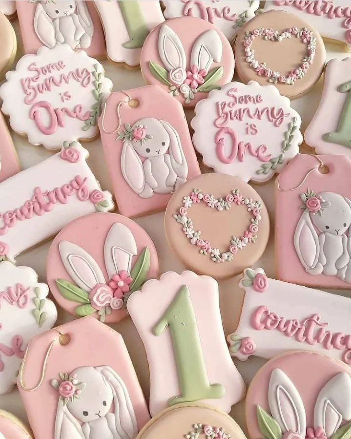 Festive Decorated Cookies with Whimsical Bunny Motifs and Floral Accents.